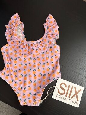 SIIX Collection Peach Print Ruffled Baby One-Piece